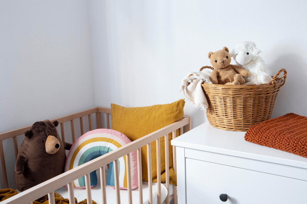 Interior of a kids' room with toys and a crib, featuring a warm and cozy nursery decor.