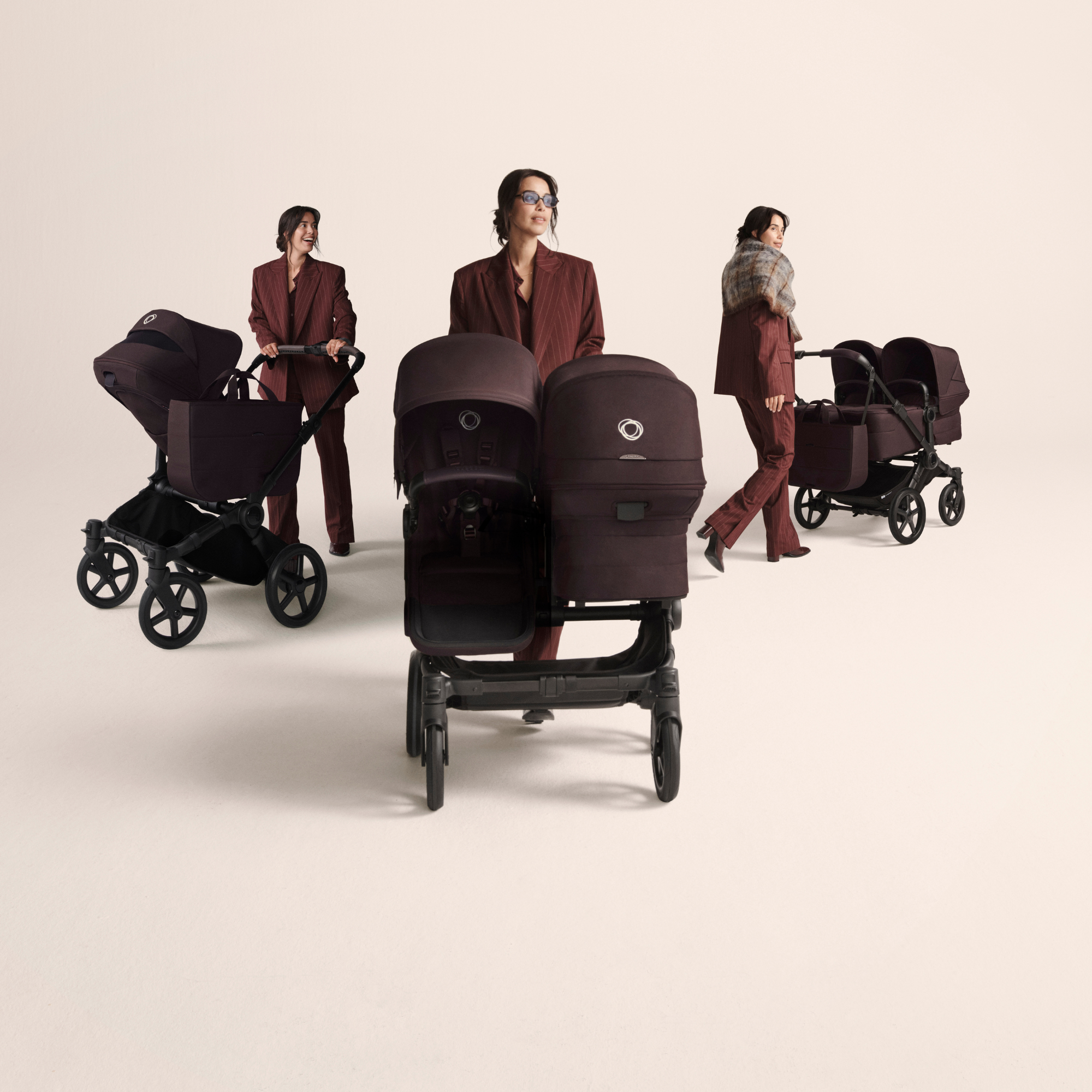 Bugaboo Donkey 6 stroller with side-by-side seats, smooth suspension, large storage, and easy single-to-double conversion. 