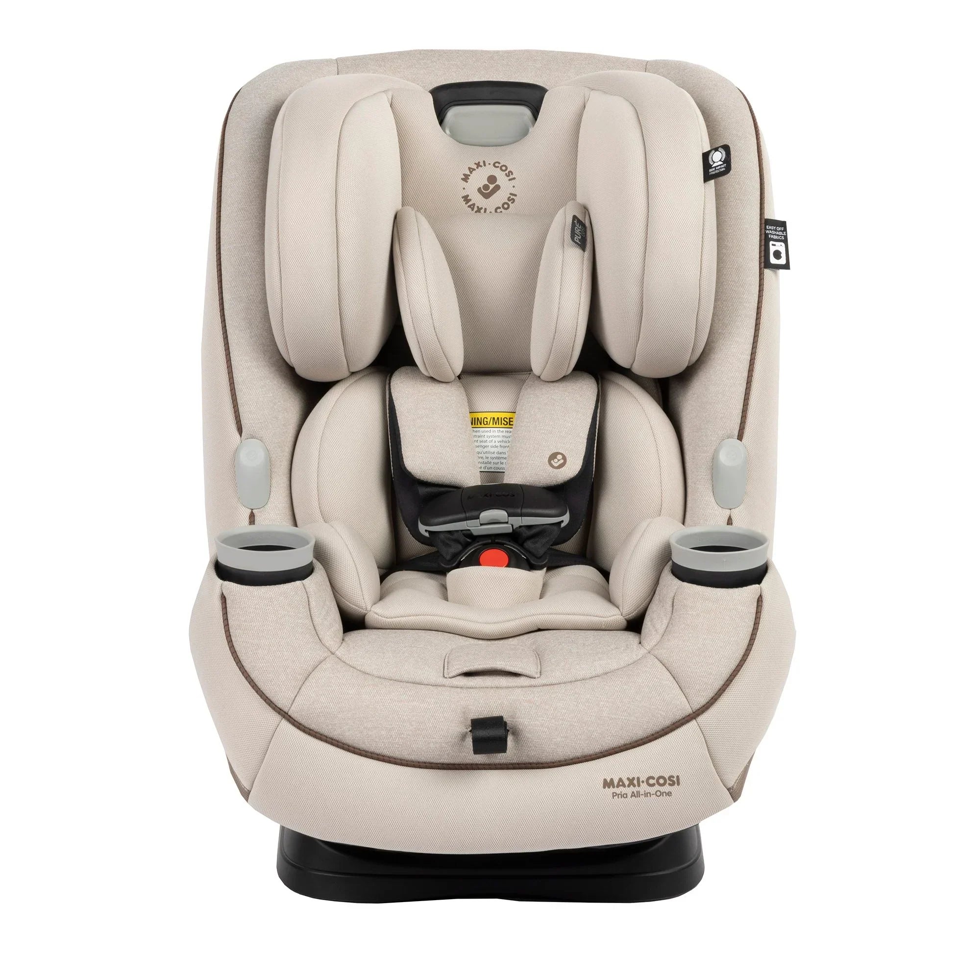 Maxi-Cosi convertible car seat in forward-facing mode with a caregiver fastening the five-point harness on a young child in a vehicle rear seat.