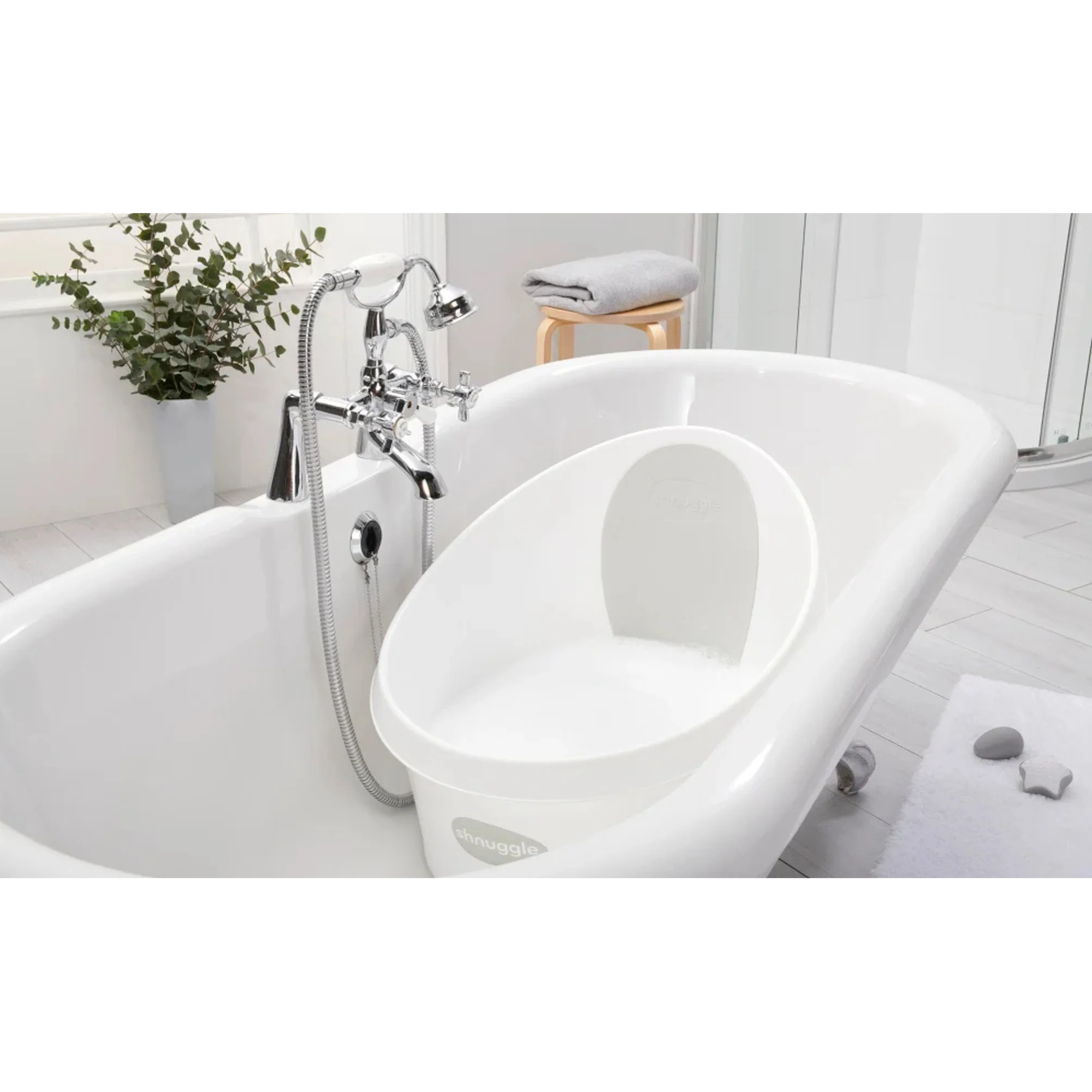 The SHNUGGLE Toddler Bath is thoughtfully designed to make bath time comfortable, secure, and enjoyable.