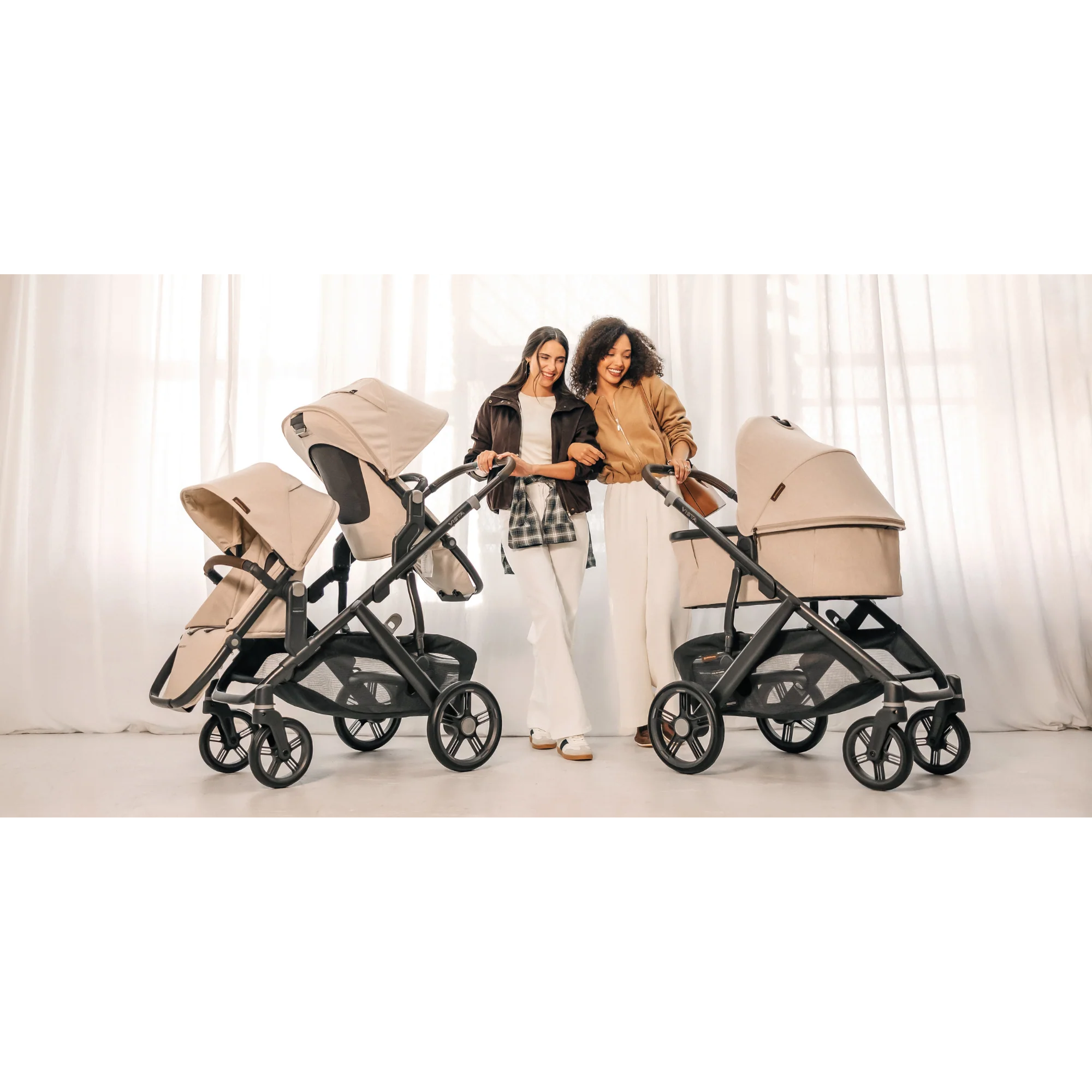 Two moms compare the UPPAbaby Vista V3 stroller in double mode, showcasing its flexible seating for growing families.