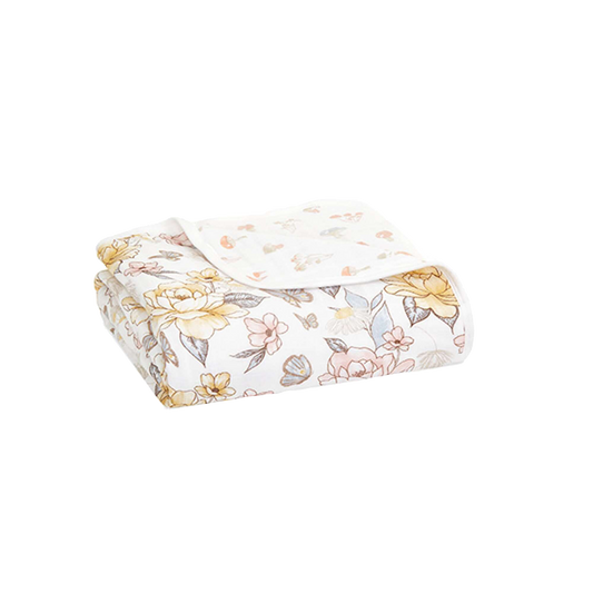 ADEN + ANAIS Organic Dream Blanket in Earthly/Rosewood floral print, folded to show soft, breathable cotton fabric and corner stitching.