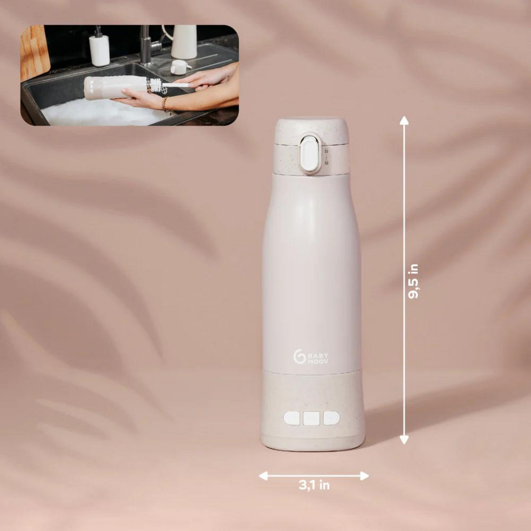 Babymoov Moov & Feed portable baby bottle warmer in neutral beige with 9.5-inch height and 3.1-inch width dimensions displayed for travel use.