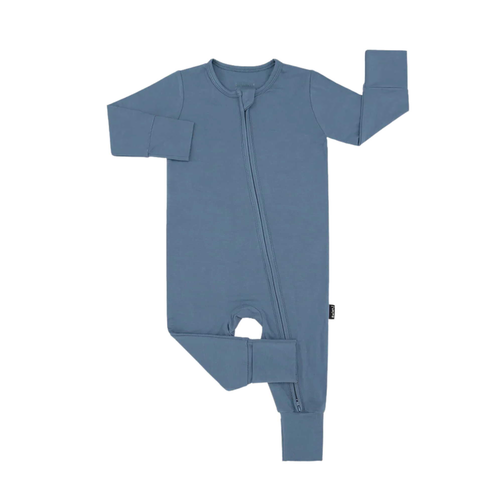 Soft bamboo footless baby sleeper in neutral beige with fold-over cuffs, laid flat to show stretchy fabric and cozy design.