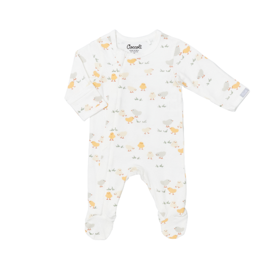 White cotton baby sleeper with long sleeves and footed legs, decorated with soft yellow and gray animal print, designed for newborn comfort.