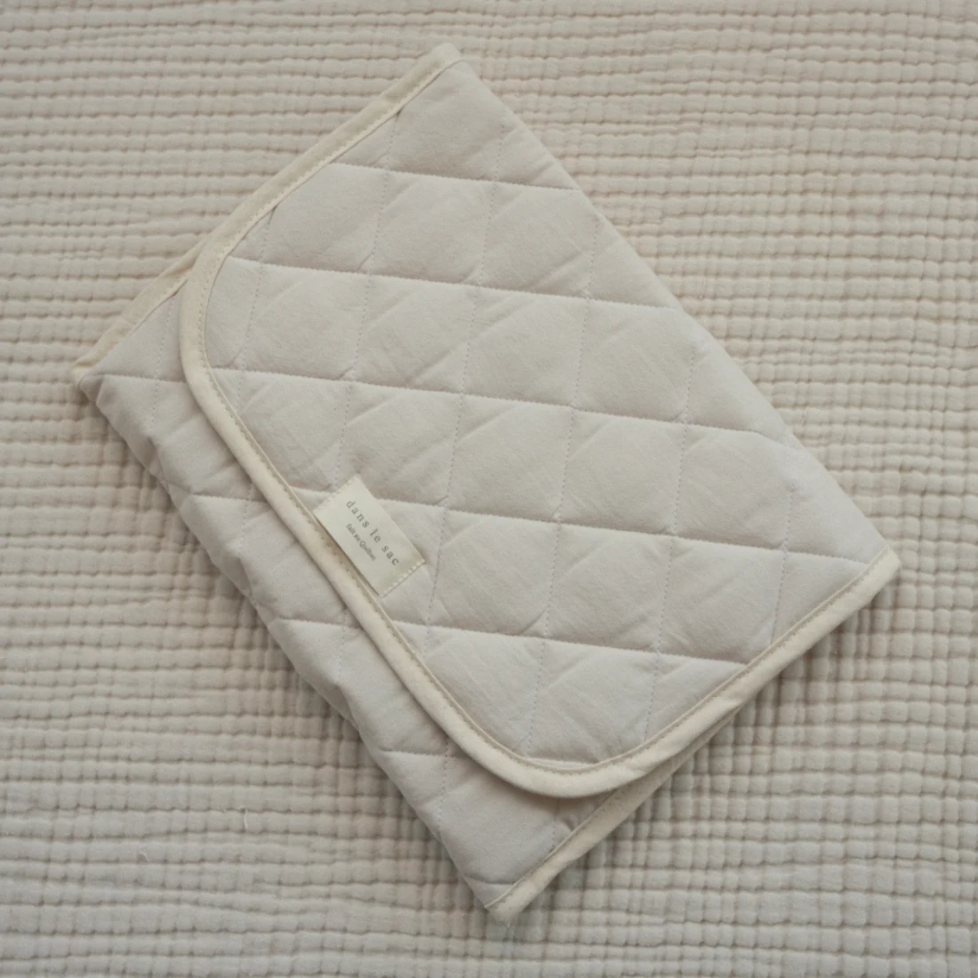 DANS LE SAC Tapis à langer