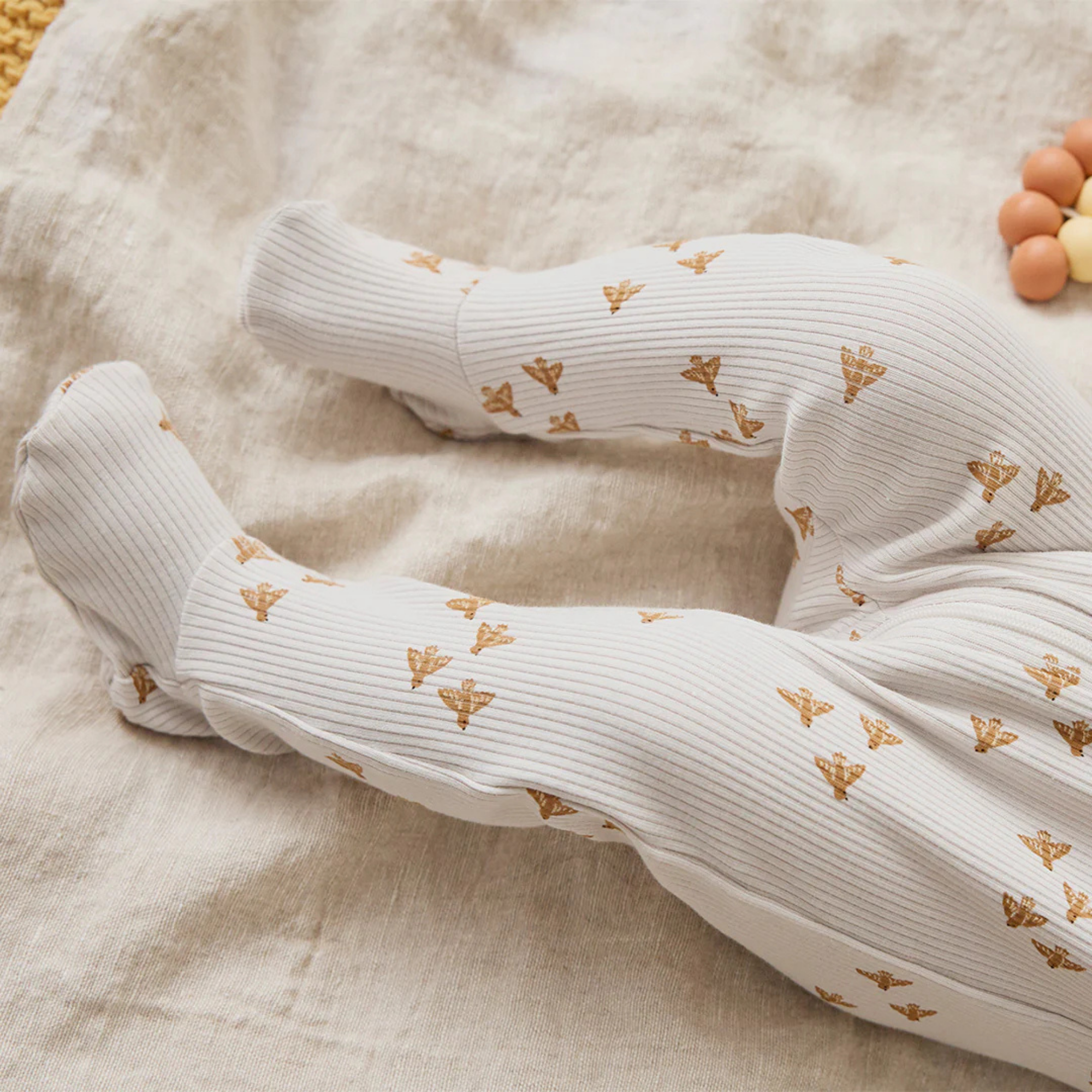 Imprimé oiseaux FIRSTS sur cale-pied beige