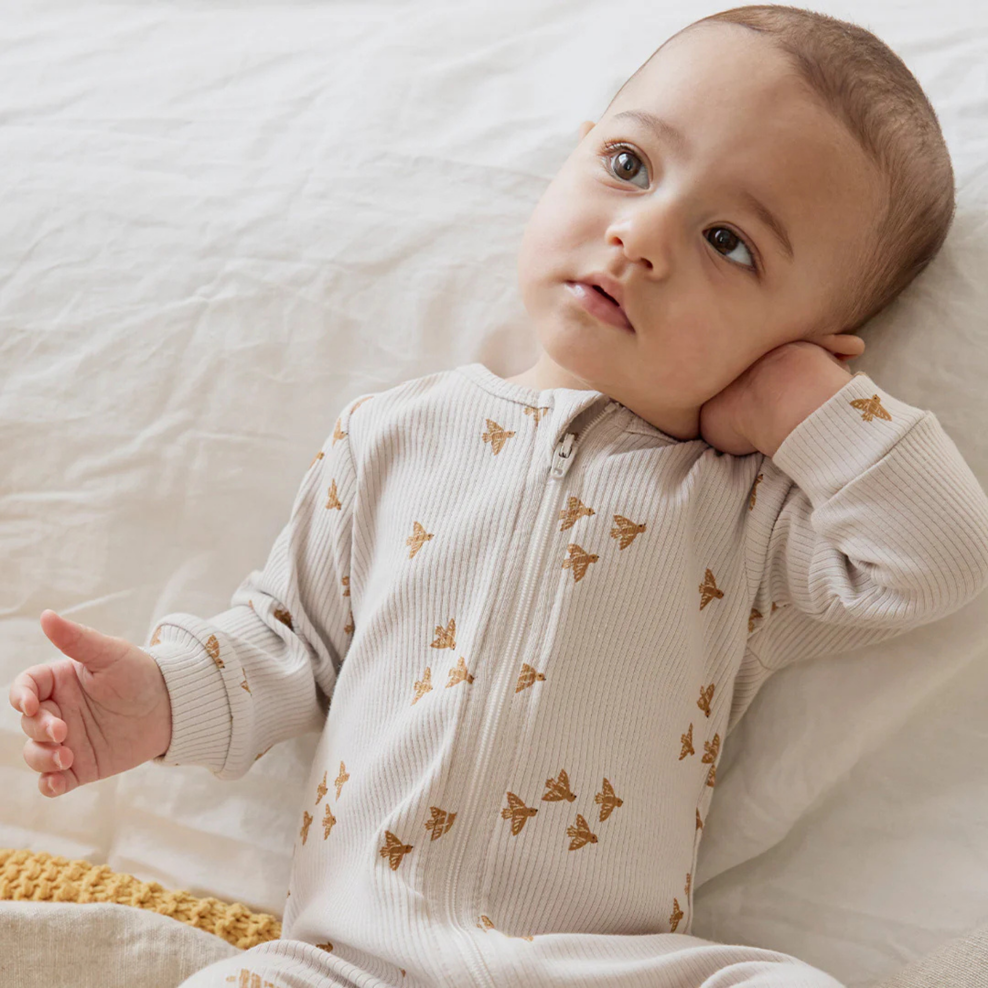 Imprimé oiseaux FIRSTS sur cale-pied beige