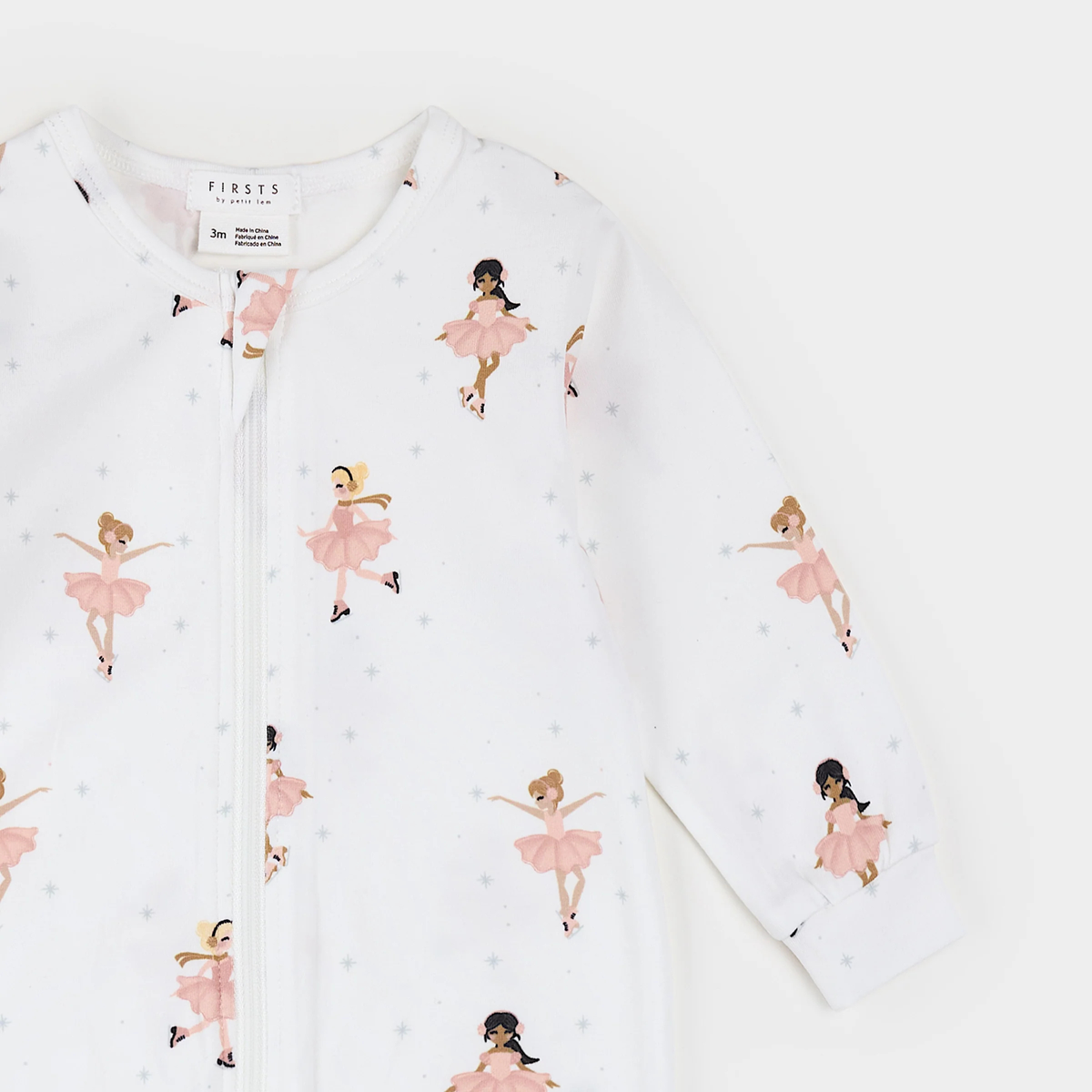 FIRSTS Figure Skaters Print on Off-White Footed Sleeper
