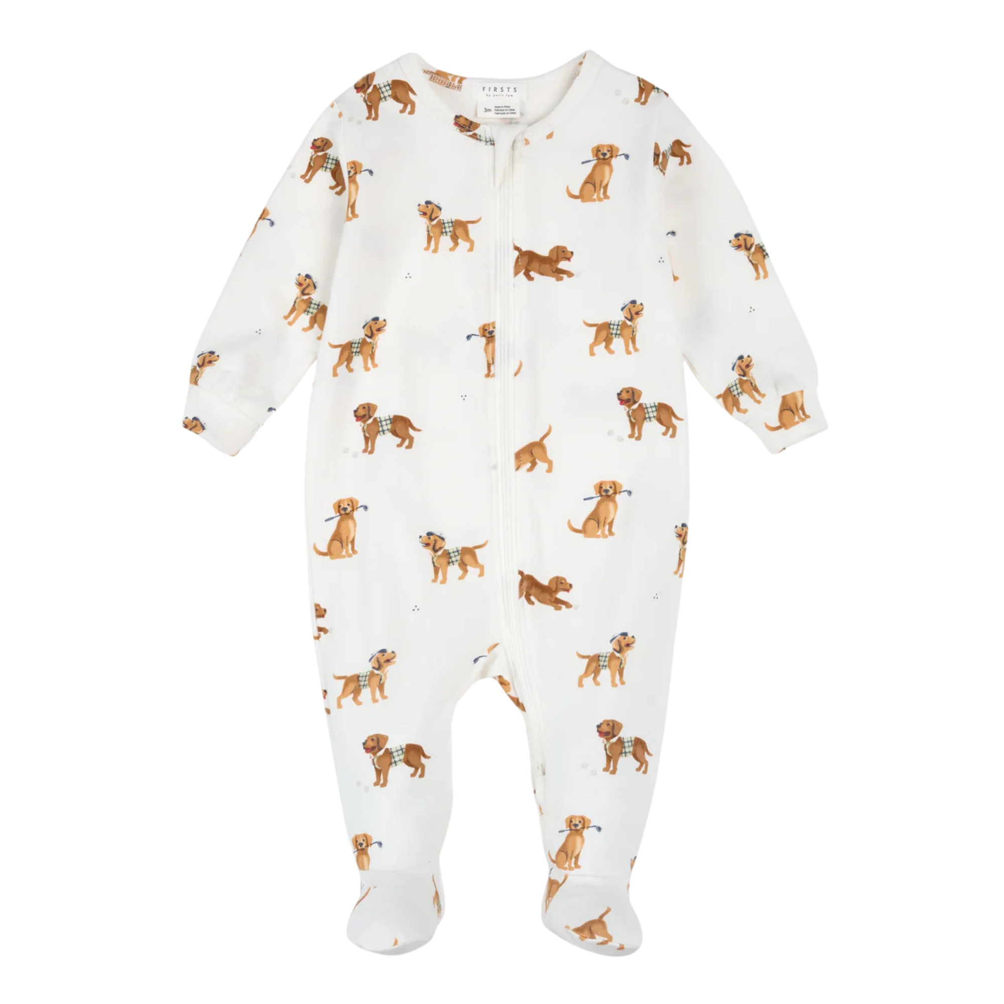 PREMIERS chiots de golf sur un dormeur à pattes blanc cassé