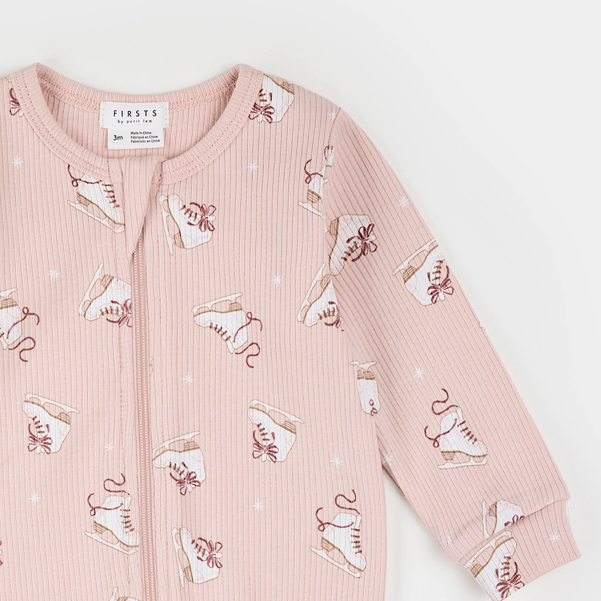 FIRSTS Ice Skates Print on Light Pink Ribbed Sleeper