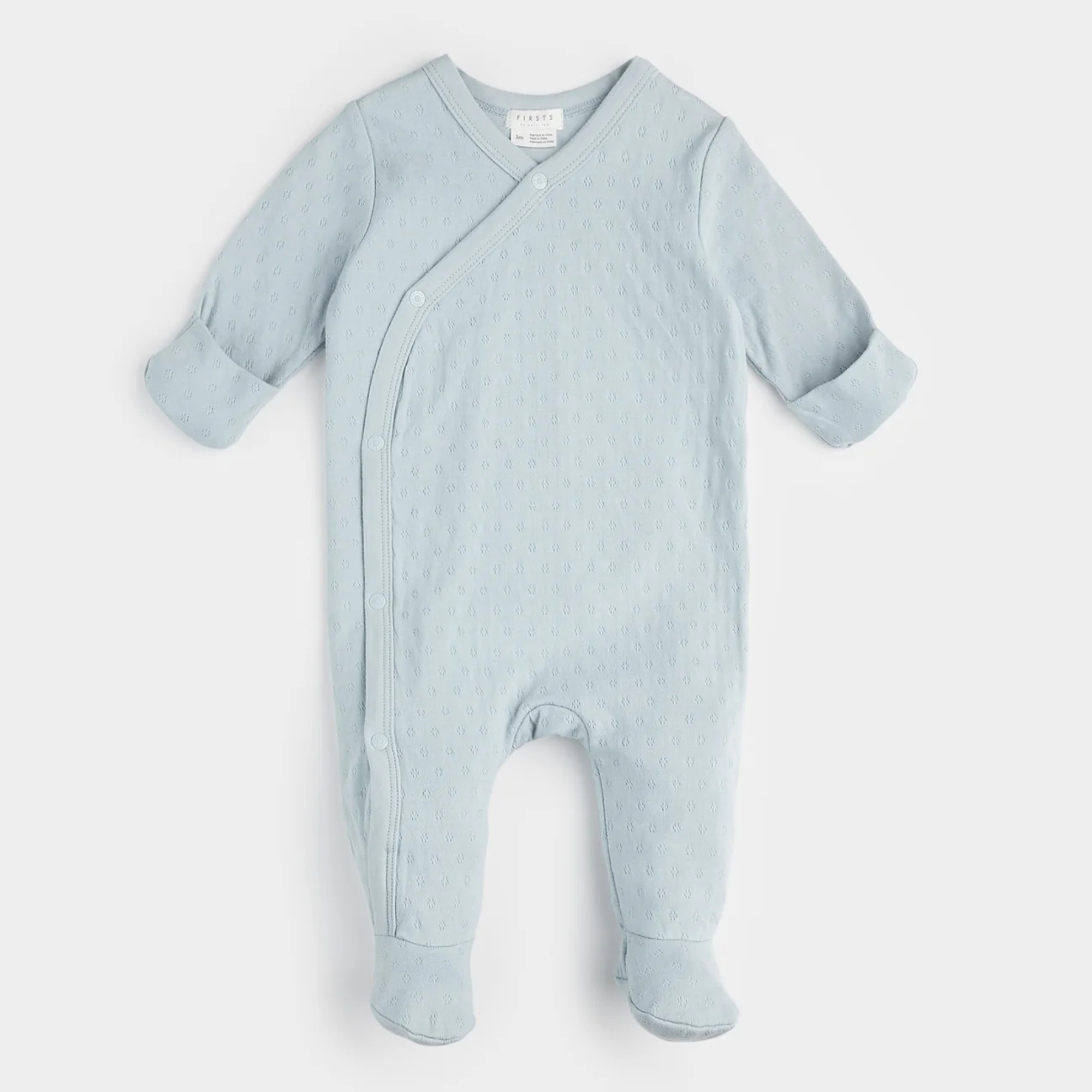 Grenouillère croisée en tricot pointelle bleu clair FIRSTS 