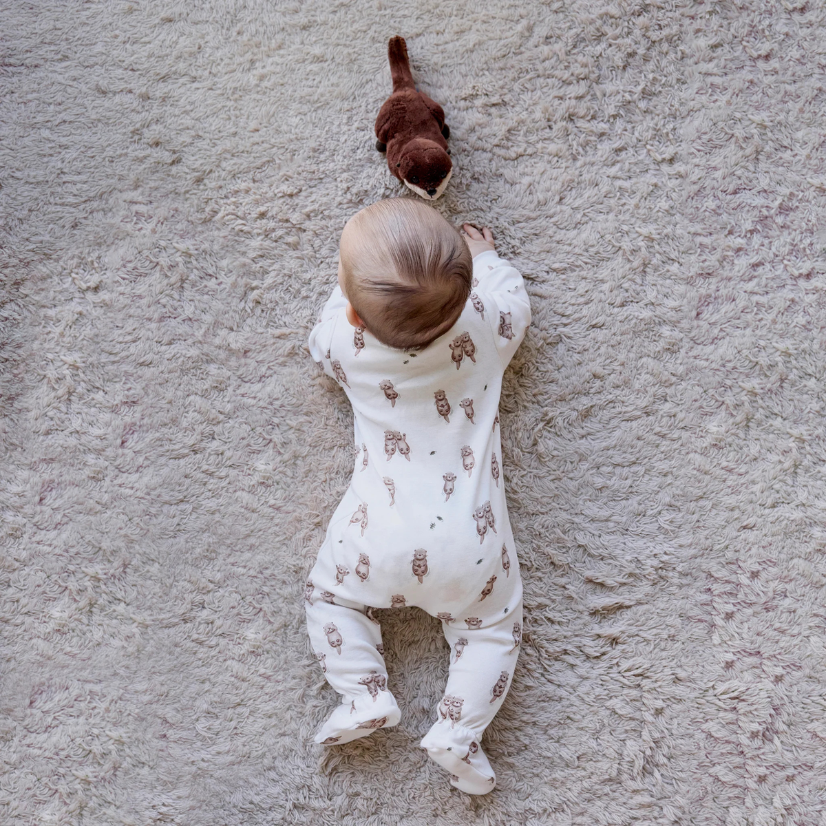 FIRSTS Otter Print on Off-White Footed Sleeper