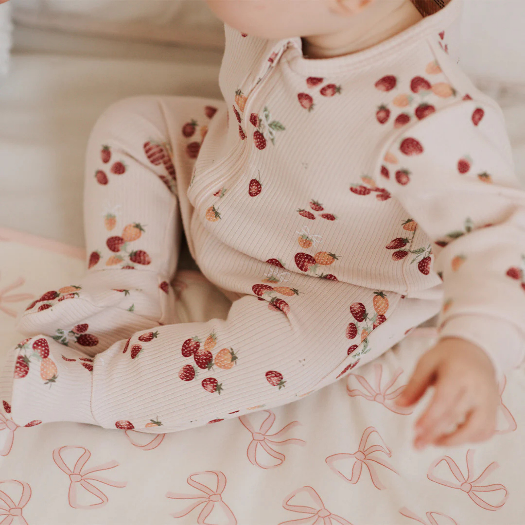 FIRSTS Strawberry Print on Light Pink Footed Sleeper