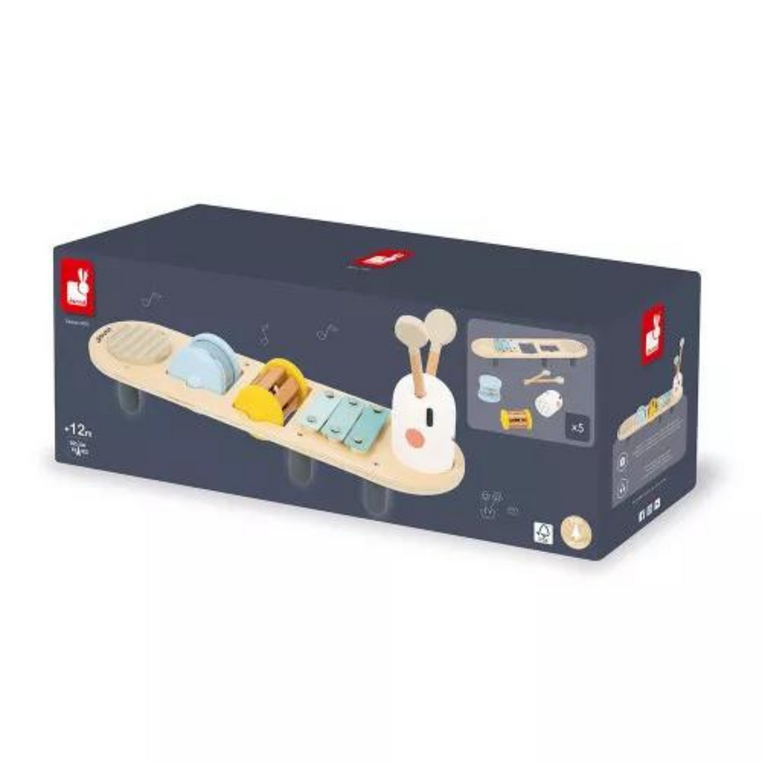 Janod wooden musical activity board for toddlers 12+ months, featuring xylophone, drum, and interactive sound elements in special design box.
