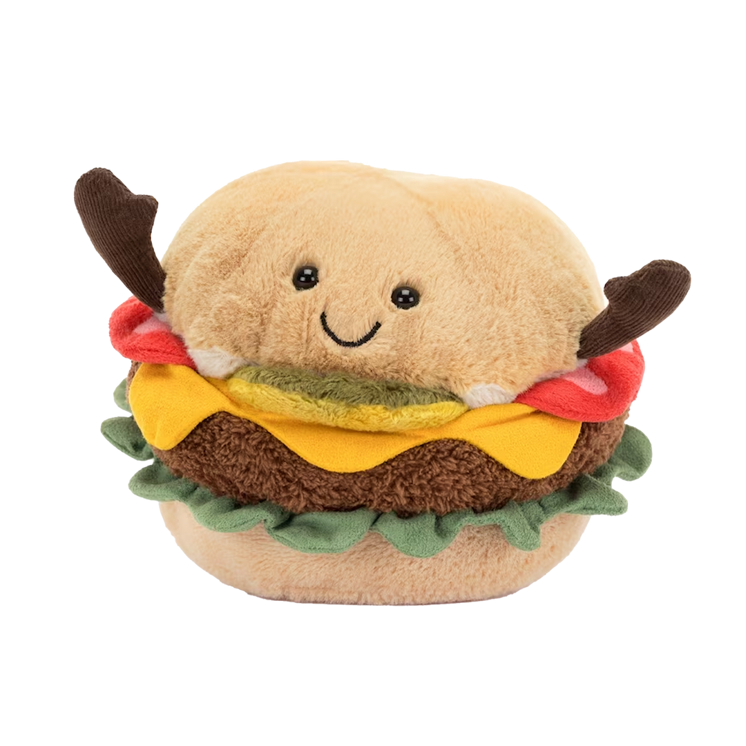 Jellycat Amuseables Burger plush with smiling face, cord arms, layered lettuce, cheese, patty, and golden bun, shown on white background.