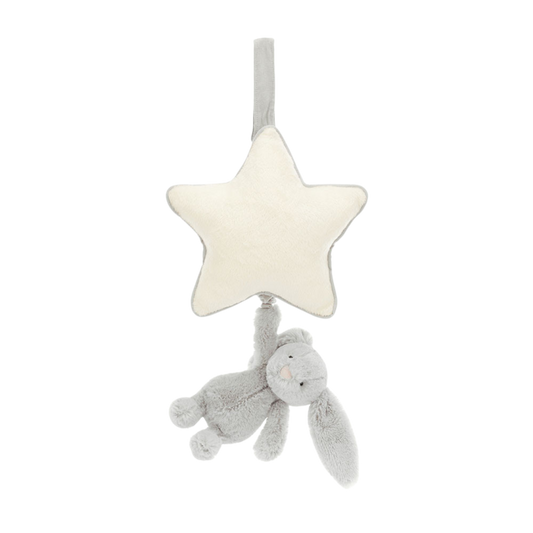 Soft plush baby musical toy shaped like a cream star with a small grey bunny hanging beneath, designed for crib or stroller use.