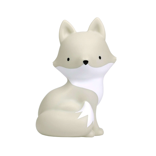 Beige fox-shaped silicone night light with a white chest and tail tip, designed as a soft glowing nursery lamp for children’s rooms.