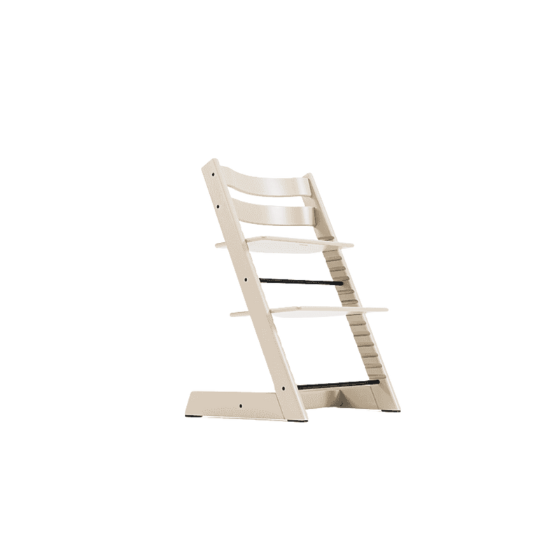 Adjustable wooden high chair in natural finish with ergonomic seat and footrest, designed to grow with your child from baby to toddler years.