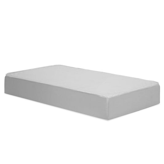 Rectangular grey fitted crib sheet with smooth corners, shown on a mattress to highlight snug fit and soft fabric texture.