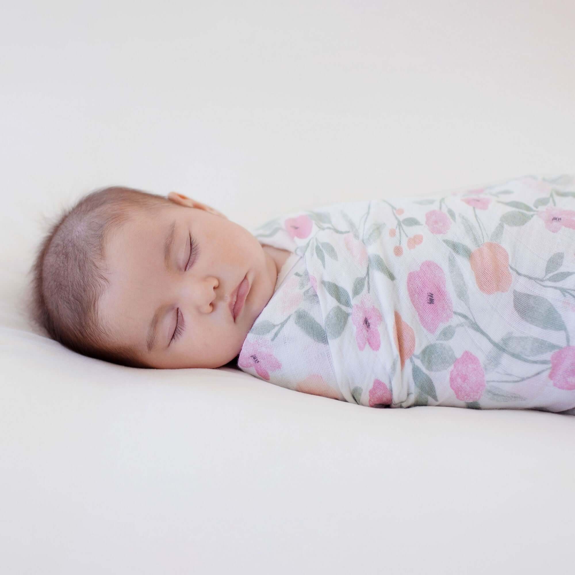 Baby sleeping in Swaddle