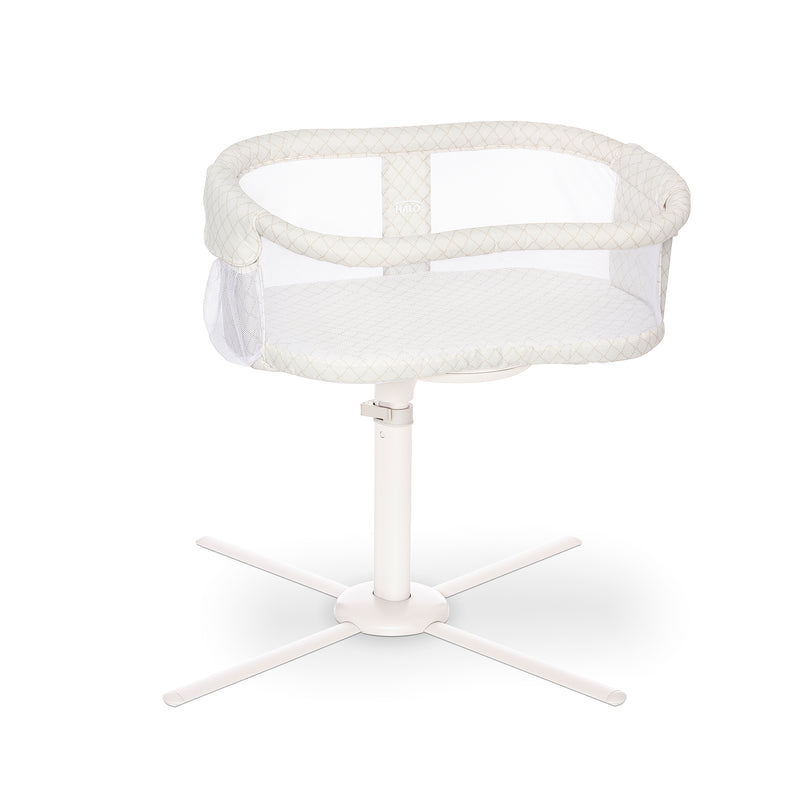 A white oval baby bassinet with breathable mesh sides on a sleek swivel stand, shown centered on a white background for product viewing.