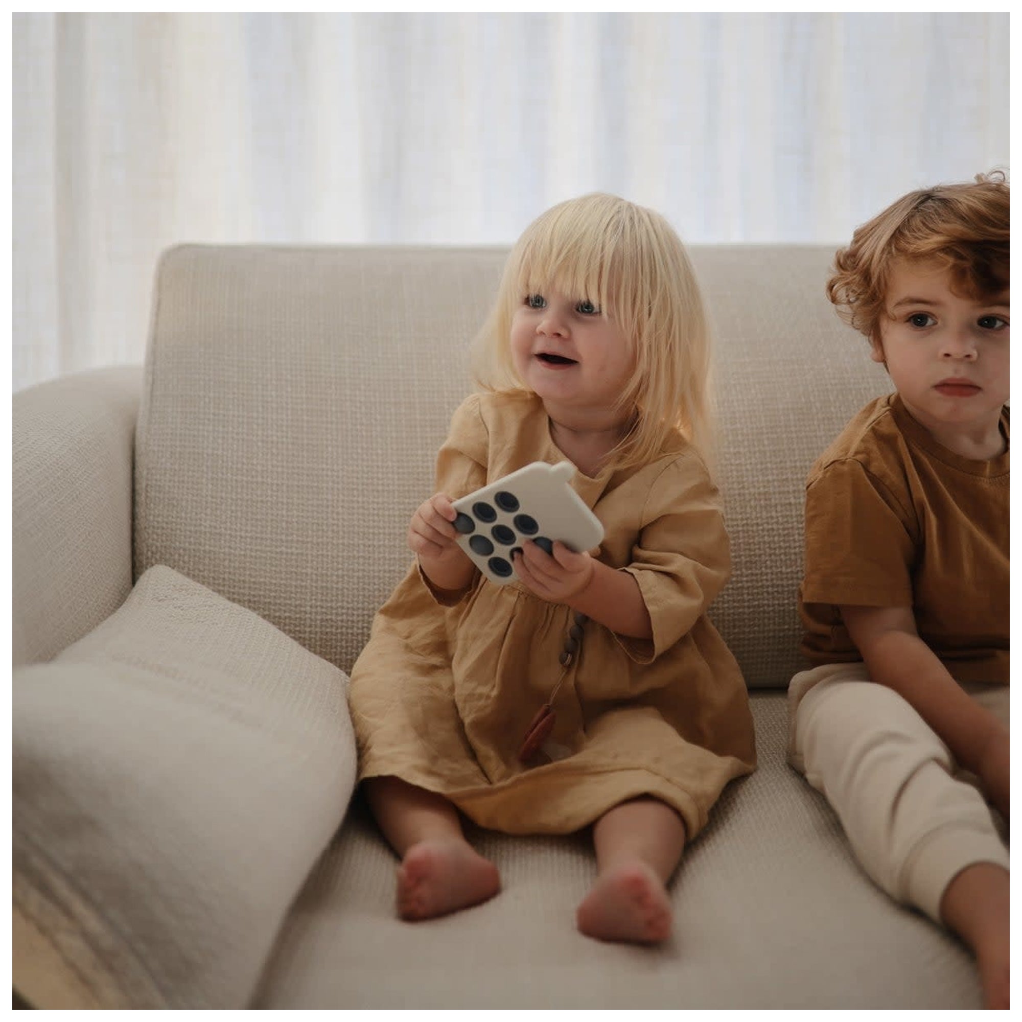 Jouet à presser pour téléphone MUSHIE - Bleu Cambridge