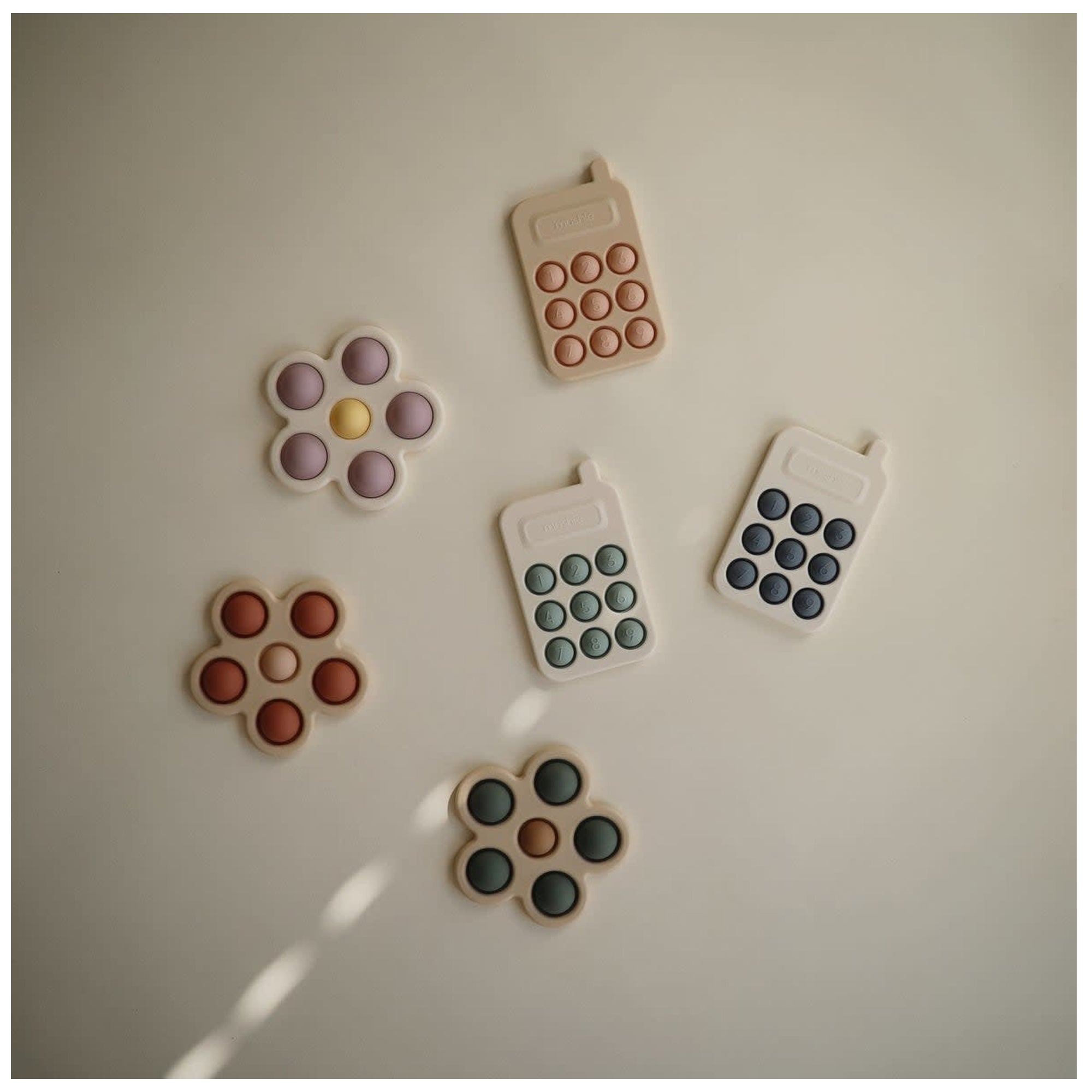 MUSHIE Phone Press Toy - Tradewinds