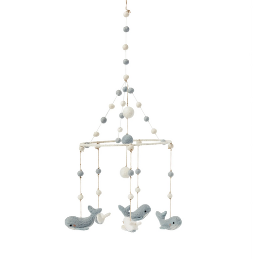 Hanging two-tier baby mobile with soft grey felt whales and cream wool beads, crafted from 100% wool felt for nursery decor.